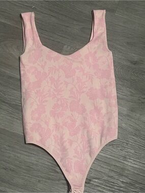 Free People Printed Clean Lines bodysuit in a bubble bath combo color.